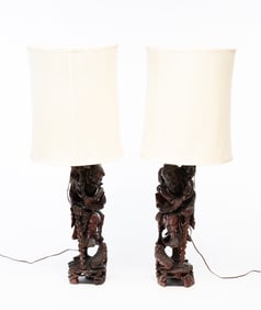 A PAIR OF CHINESE CARVED FIGURAL LAMPS.