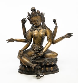 TIBETAN CAST BRONZE SIX-ARM BUDDHIST DEITY.