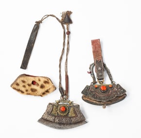 TWO TIBETAN LEATHER, SILVER, AND BRASS TINDER POUCHES, BAGHUS, OR CHUCKMUKS.