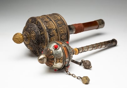 TWO TIBETAN METAL AND WOOD PRAYER WHEELS.
