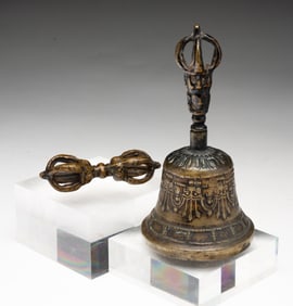 A TIBETAN BRONZE VAJRA AND TEMPLE BELL.