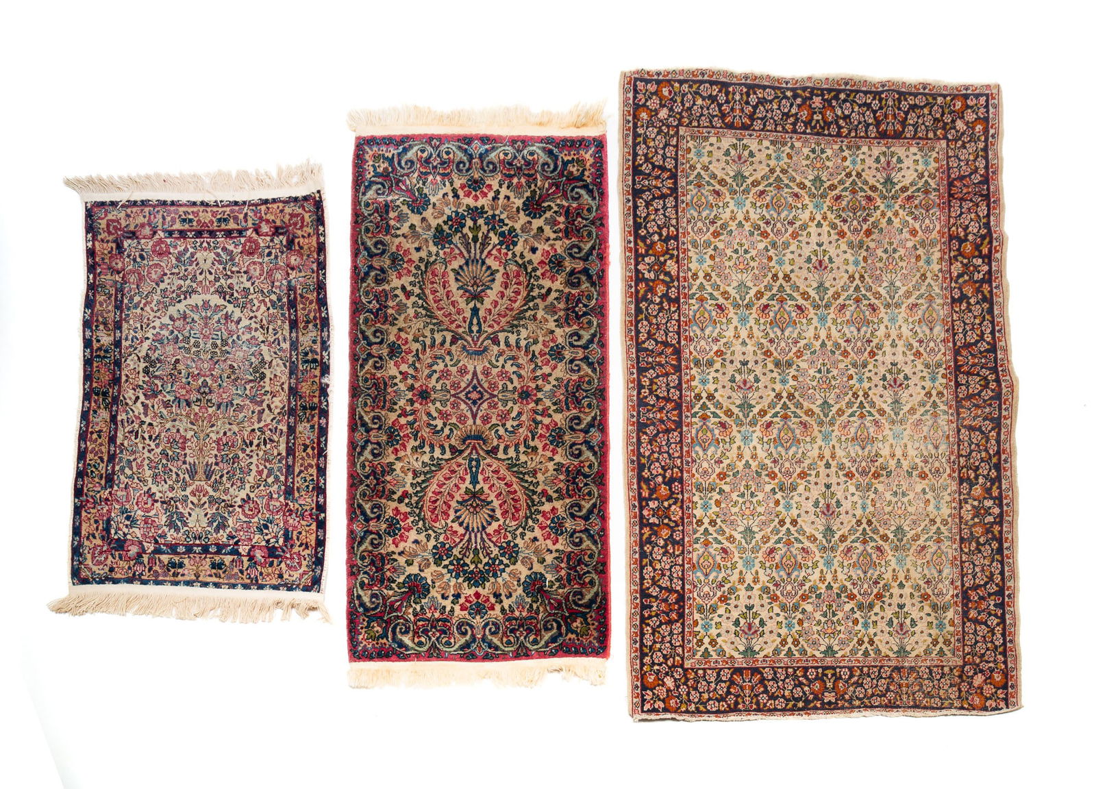 THREE FLORAL HAND KNOTTED RUGS. (1 of 11)