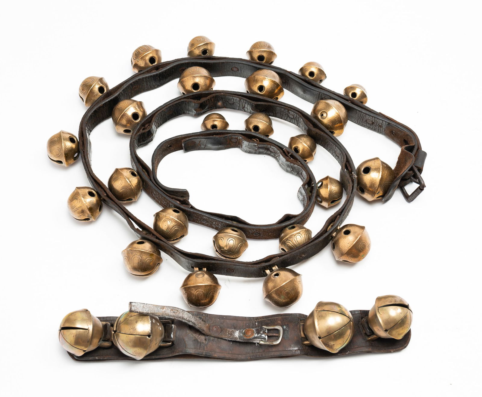 TWO LEATHER STRAPS WITH BRASS SLEIGH BELLS. (1 of 3)