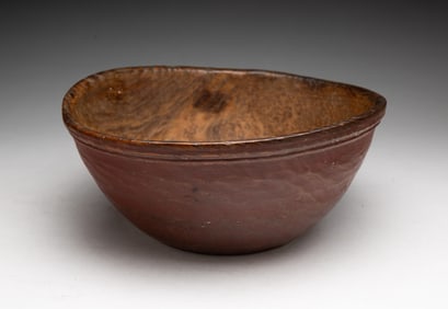 NATIVE AMERICAN CARVED AND PAINTED BURLWOOD BOWL.