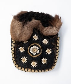 ATHABASCAN BUFFALO, SEAL, AND CARIBOU FUR FOOT WARMER.