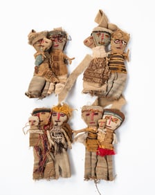 FOUR GROUPS OF PERUVIAN CHANCAY CLOTH BURIAL DOLLS.
