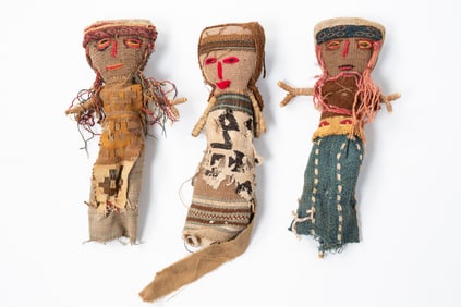 THREE PERUVIAN CHANCAY CLOTH BURIAL DOLLS.
