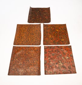 FIVE TOOLED LEATHER PANELS.