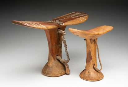 TWO AFRICAN CARVED WOOD HEADRESTS.