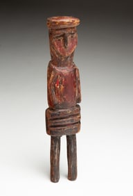 PRIMITIVE CARVED AND PAINTED WOODEN FIGURE.