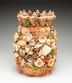 AMERICAN FOLK ART SHELL AND CORAL-DECORATED JAR.