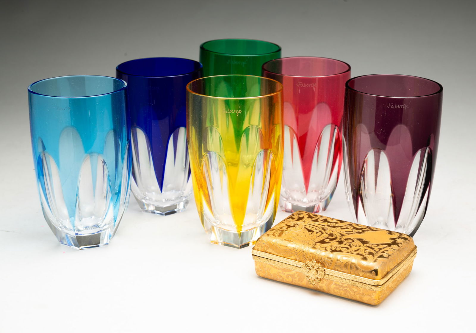 SIX FABERGÉ "LAUSANNE" CUT-TO-CLEAR CRYSTAL HIGHBALLS PLUS FABERGÉ PORCELAIN TRINKET BOX. (1 of 9)