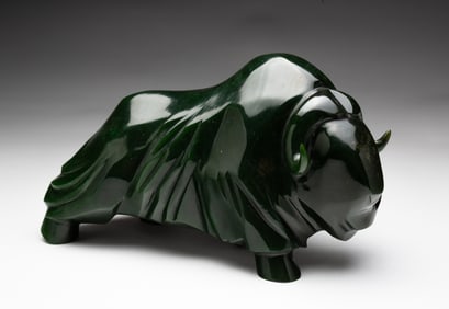 LYLE SOPEL (CANADIAN, B. 1951) CARVED NEPHRITE MUSKOX SCULPTURE.