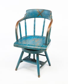 AMERICAN BLUE-PAINTED AND GILT-DECORATED SWIVEL LODGE CHAIR.
