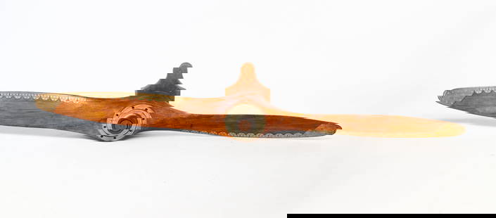AMERICAN LAMINATED PINE PROPELLER.: American, 20th Century. Eight layers, scalloped brass leading edge and impressed on side of hub "Eng. 3-755-9, H.P. 225, RPM 2009, AT 17, DWG.RC., 43K13605, 3-6 91". 90.5"w.