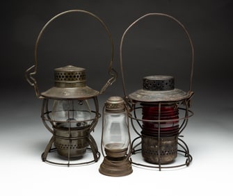 TWO RAILROAD LANTERNS AND SKATER'S LAMP, INCL. PENNSYLVANIA RAILROAD MARKED HANDLAN.