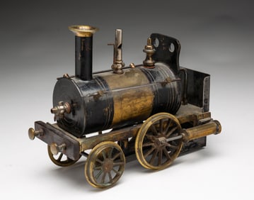 EARLY GERMAN LIVE STEAM POWERED TOY LOCOMOTIVE.
