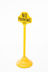 CAST IRON "NO PARKING" SIGN.
