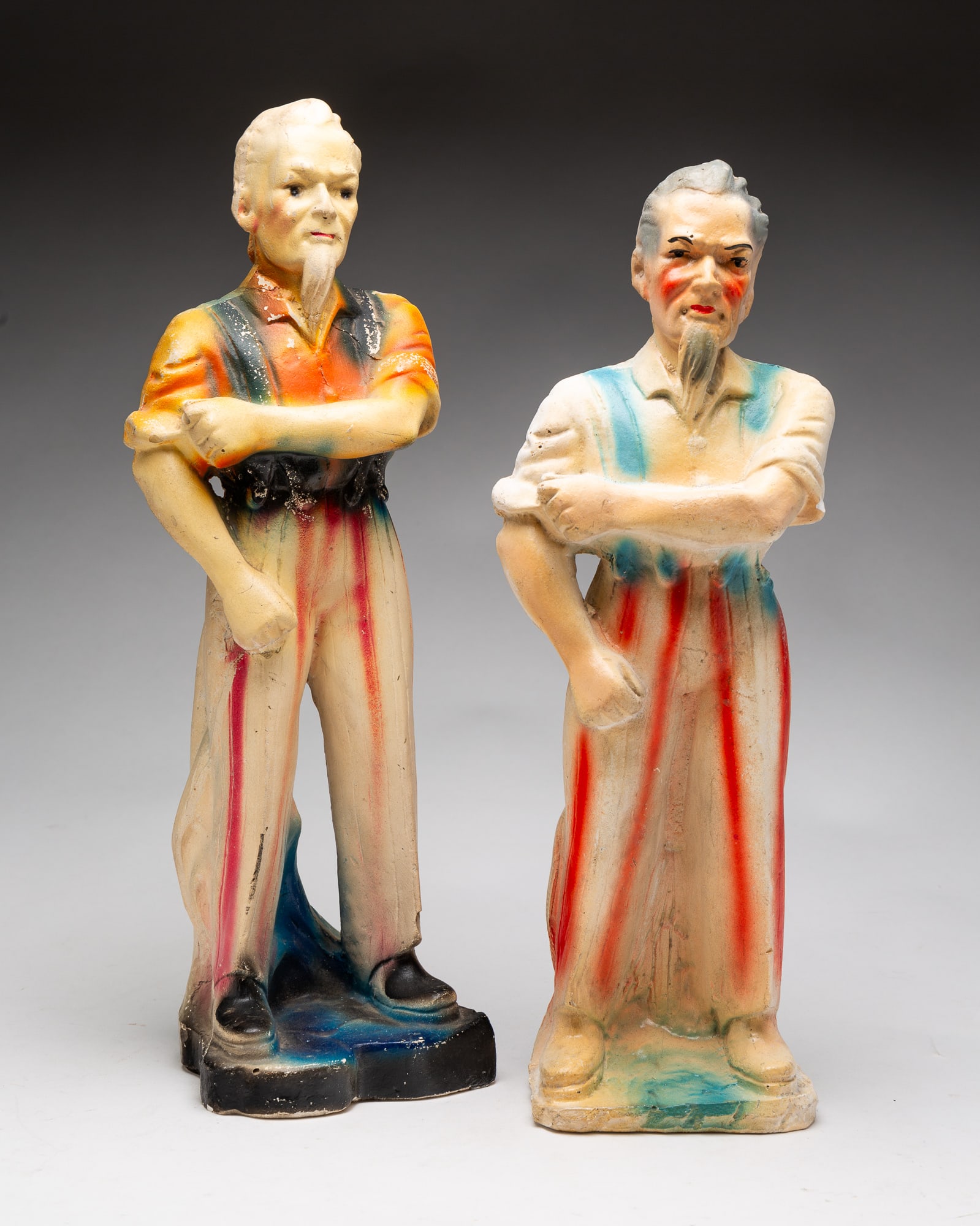 TWO AMERICAN "UNCLE SAM" MOLDED AND PAINT-DECORATED CHALKWARE CARNIVAL FIGURES. (1 of 5)
