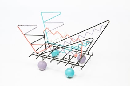 MEMPHIS STYLE POLYCHROME METAL WIRE MAGAZINE RACK.