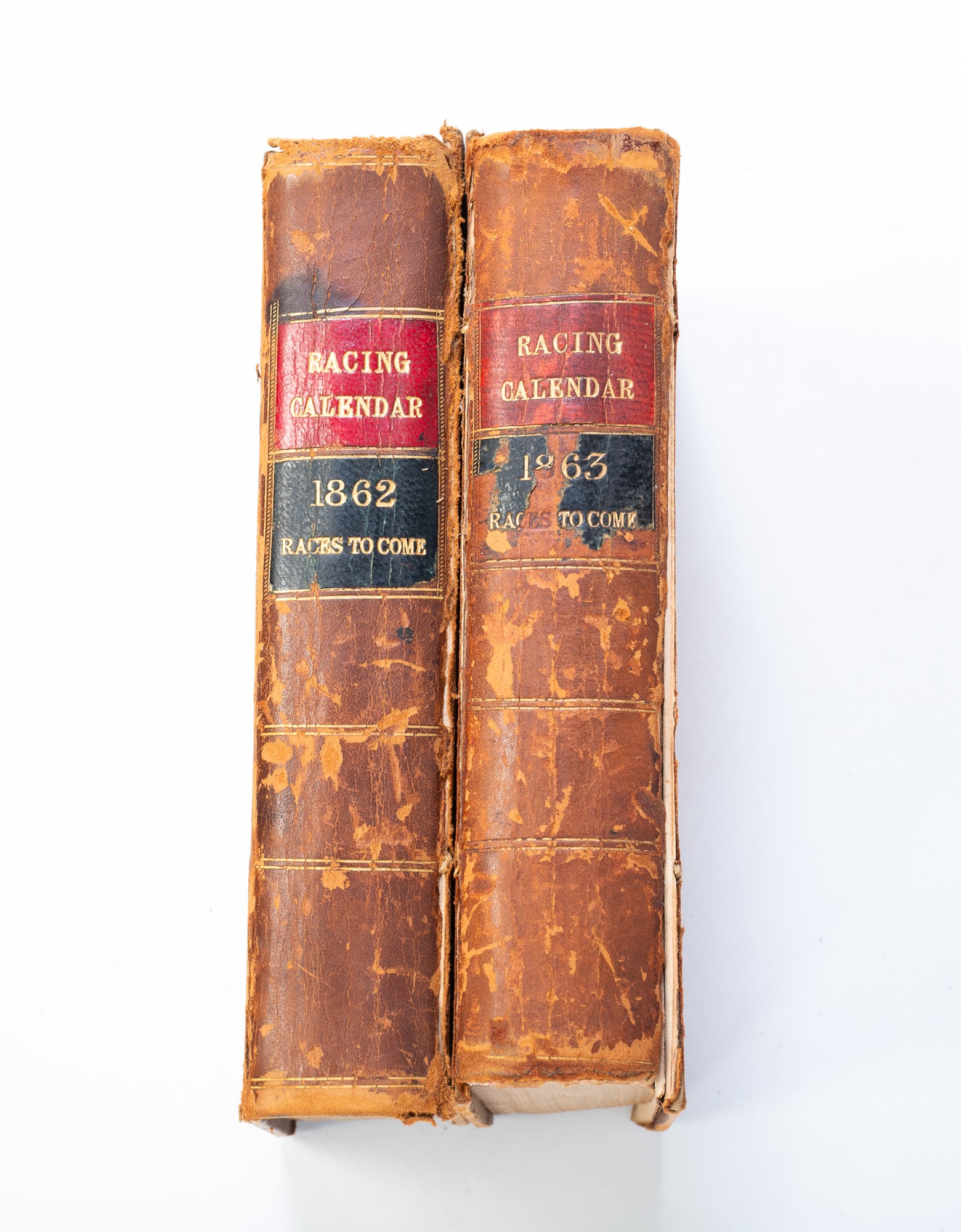 TWO VOLUMES OF "RACING CALENDAR".: England, 19th Century. By C.J. and E. Weatherby, printed by C.W. Reynell, London 1862 and 1863.
