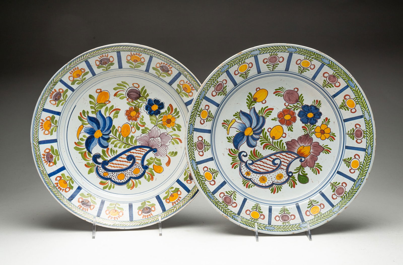 TWO DELFT FAIENCE SHALLOW BOWLS WITH POLYCHROME DECORATION. (1 of 5)