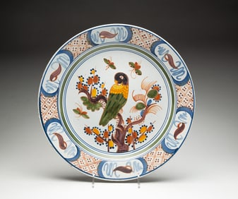 DELFT FAIENCE CHARGER WITH POLYCHROME DECORATION.