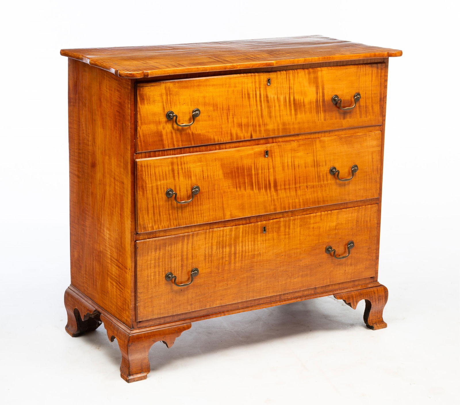 AMERICAN CHIPPENDALE TIGER MAPLE THREE-DRAWER CHEST. (1 of 5)
