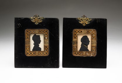 PAIR OF AMERICAN SCHOOL MINIATURE CUT PAPER SILHOUETTE PORTRAITS OF LYDIA AND CHARLES WALES.