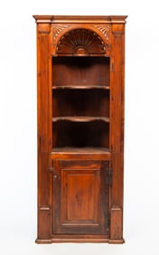 COLONIAL REVIVAL ARCHITECTURAL CORNER CUPBOARD.