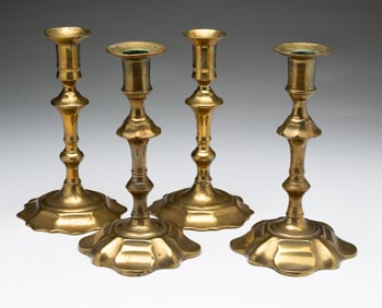 TWO PAIRS OF QUEEN ANNE CANDLESTICKS.