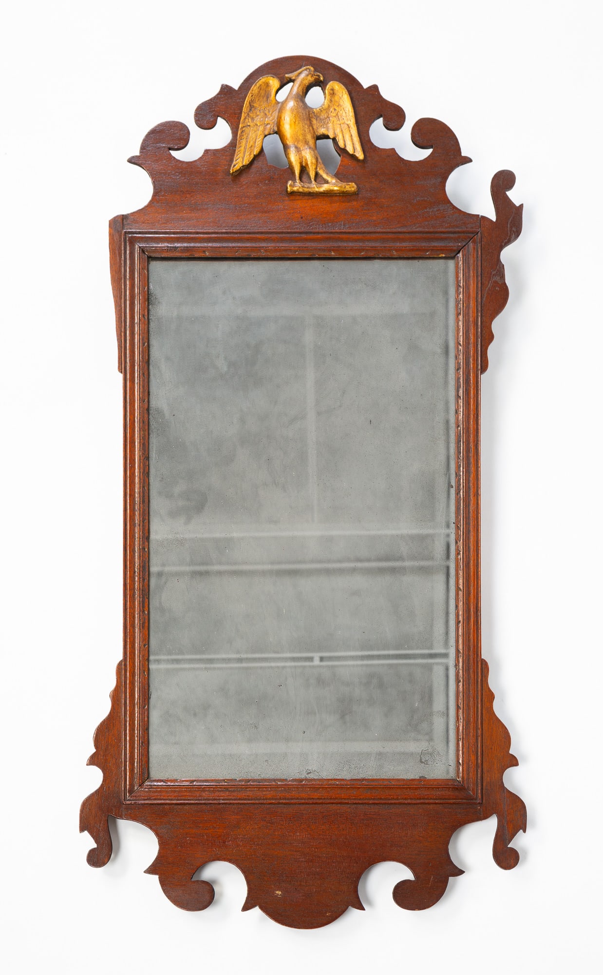 AMERICAN FRET-CARVED MAHOGANY AND PARCEL-GILT MIRROR WITH SPREAD-WINGED EAGLE. (1 of 5)