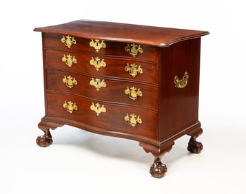 MASSACHUSETTS CHIPPENDALE MAHOGANY FOUR-DRAWER SERPENTINE-FRONT CHEST.