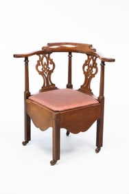 AMERICAN CHIPPENDALE MAHOGANY CORNER ARMCHAIR.