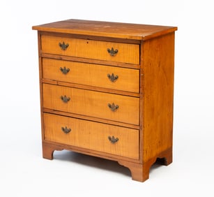AMERICAN TIGER MAPLE AND WALNUT FOUR-DRAWER CHEST.