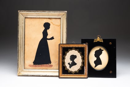 THREE CUT PAPER SILHOUETTE PORTRAITS OF WOMEN.