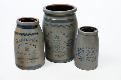 THREE HAMILTON AND JONES COBALT DECORATED STONEWARE JARS.