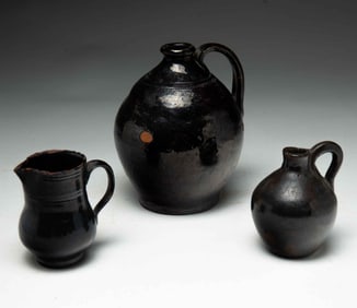 THREE AMERICAN REDWARE VESSELS WITH MANGANESE GLAZE.