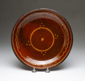 AMERICAN REDWARE PLATE WITH SLIP DECORATION.