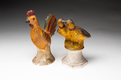 TWO PENNSYLVANIA CHALKWARE BIRD FIGURINES.