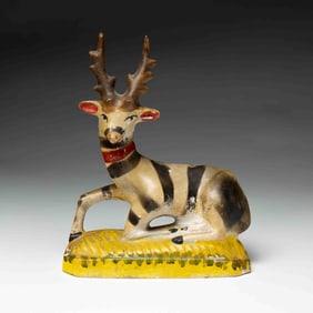 PENNSYLVANIA CHALKWARE RECUMBENT STAG.