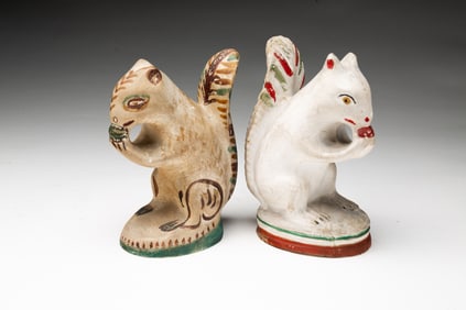 TWO PENNSYLVANIA CHALKWARE SQUIRRELS.