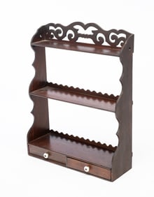 AMERICAN WALNUT THREE-TIER HANGING SHELF WITH TWO DRAWERS.