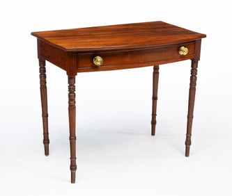 REGENCY MAHOGANY BOWFRONT DRESSING TABLE.