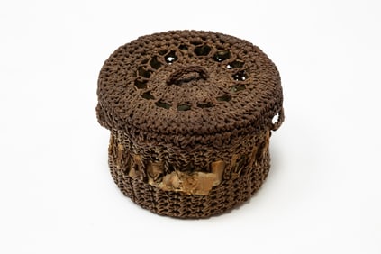AMERICAN SAILOR-MADE BRAIDED BASKET WITH LID.