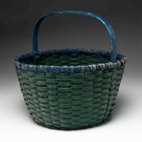 LARGE AMERICAN TEAL AND BLUE-PAINTED SPLINT BASKET.