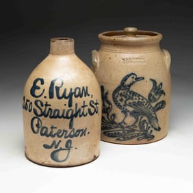 AN A.E. RYAN STONEWARE JUG AND AN R. AND B. DIEBROLL STONEWARE JAR.