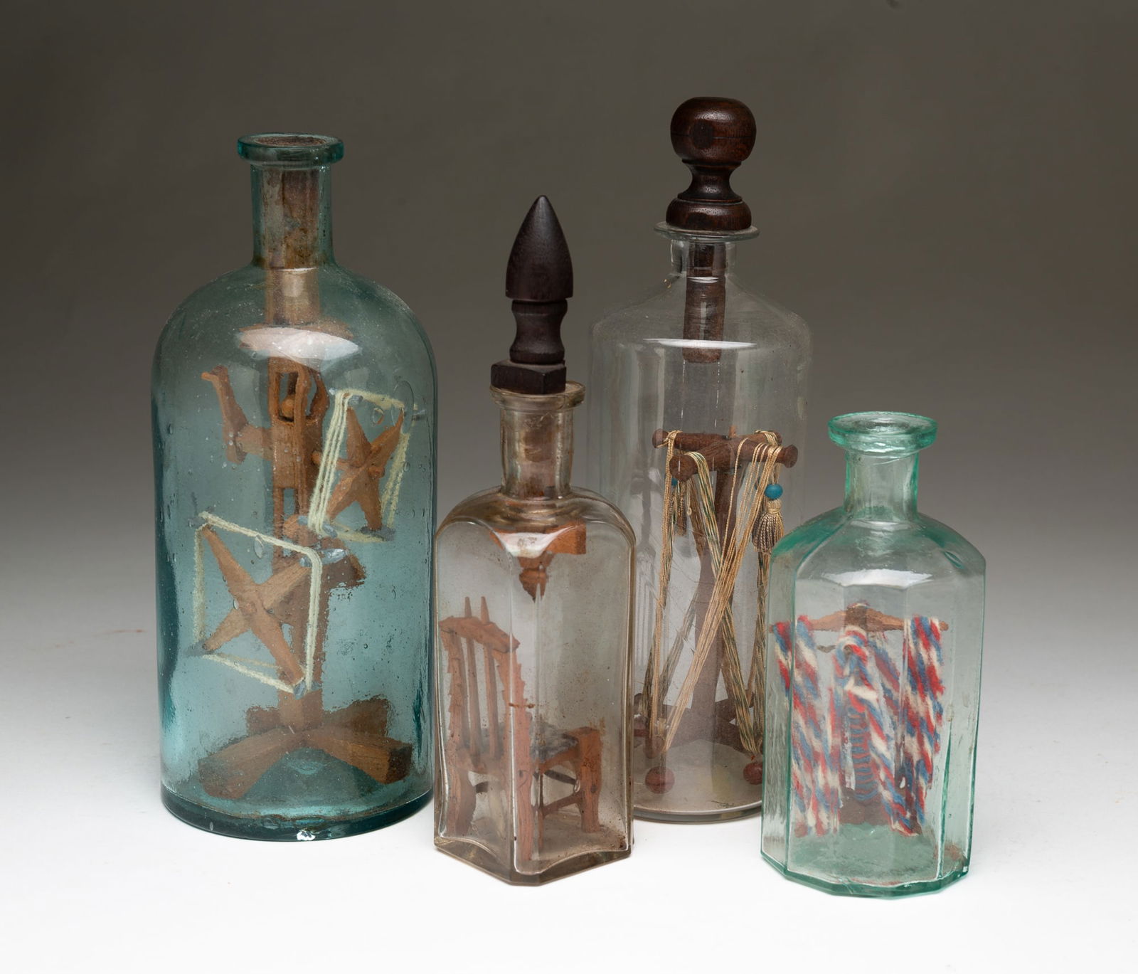 FOUR AMERICAN FOLK ART BOTTLE WHIMSEYS. (1 of 5)