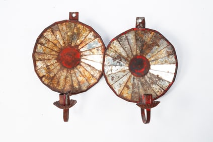 PAIR OF AMERICAN MIRROR-BACKED AND PAINTED TIN CANDLE SCONCES.