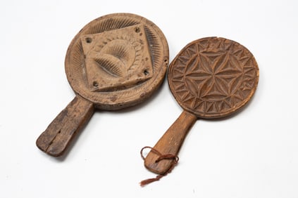 TWO AMERICAN CARVED LOLLYPOP BUTTER PRINTS.